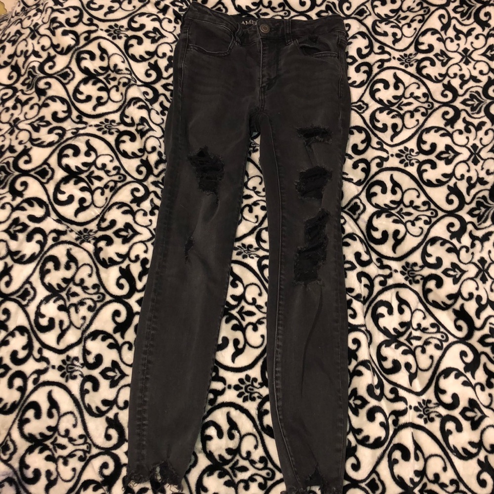 Barely used blacked ripped jeans.